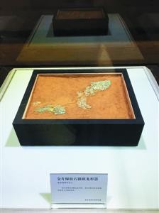 商代金片綠松石鑲嵌龍形器