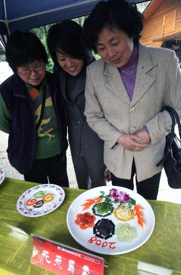 圖文-蘇州千年古鎮舉辦美食文化展 濃郁的奧運特色